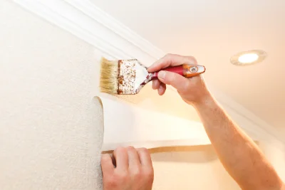 Pose de papier peint à Fontanges — revêtements muraux et toiles de verre